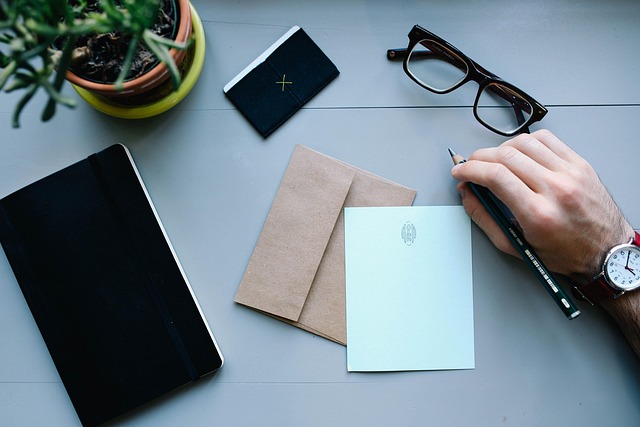 ergonomic desk setup planning notebook and keyboard layout notes